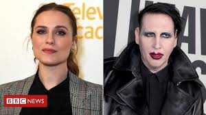 On feburary 14, 2007 she also had a black heart with a lightning bolt at the centre inked on her upper left thigh, in tribute to david bowie. Evan Rachel Wood Accuses Marilyn Manson Of Abuse Bbc News