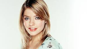 And what better way than a beautiful woman in front of christmas trees and stuff? Holly Willoughby Reveals Negative Comments Over Appearance In Early Career Bbc News