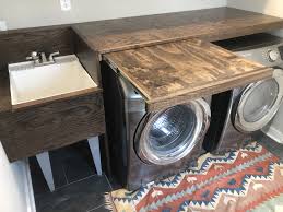 Go for that rustic but refined look of french country style with this laundry room from the utah valley parade of homes 2018 home 4 by raykon construction. Custom Rustic Modern Laundry Room Laundry Room Diy Laundry Room Remodel Laundry Room Folding Table