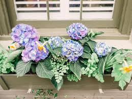 Fill the bottom of the window box planter with plastic water bottles. Window Box Planter Tips Hgtv