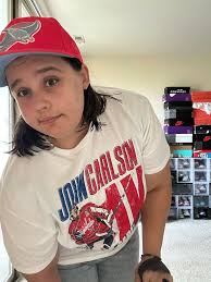 Humorous discussion about a woman's knee cap appearance