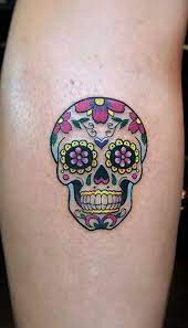 Creative skull tattoo design on back of hand. 100 Unique Sugar Skull Tattoos Designs Ideas Tattoo Me Now