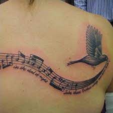 Music makers or music lovers? 32 Cool Music Note Tattoo Ideas