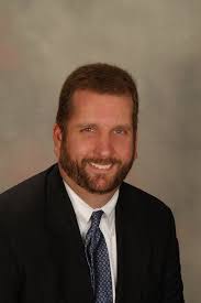 Christopher Johnson Promoted to Senior VP Director