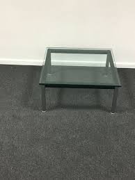 The 15mm thick clear glass top rests on a black enameled steel frame and tubular steel frame legs. Le Corbusier By Cassina Coffee Table Lc10 P Catawiki