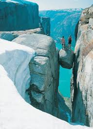 The rock is over 3,280 feet (1,000 metres) high and offers a. The Famous Kjeragbolten Above The Lysefjord Norway Places To Travel Places To See Places To Go