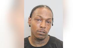 East Freeway SWAT scene: Barricaded suspect in custody, wanted for felony  murder