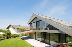 But performance is only half the story. Slope Roof House With Futuristic Interiors