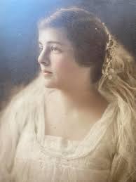 Does anyone know who this is. Eyes and nose look like my mother but I do t  think this is my grandmother.