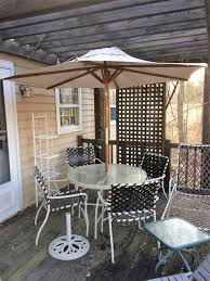 White Glass Top Patio Table And Set 4 Arm Chairs Solid Garden Umbrella W Stand Three Lounge Chairs Glass Top E Round Patio Table Glass Top End Tables Patio
