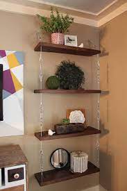 how to make suspended shelves with steel cable and turnbuckles bookshelves diy hanging inexpensive wine racks