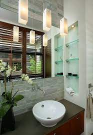 The contemporary style of this shelf complements the bathroom decor. 15 Bathroom Spaces With Glass Shelving Home Design Lover