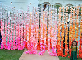 Ombre Paper Flowers Makes A Great Backdrop For Mehendi Party Bollywood Party Decorations Indian Party Themes Bollywood Theme Party
