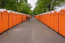 Orange Porta Potties Stock Photo - Download Image Now - Potty, Music  Festival, Door