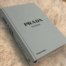 Their glossy coffee table book charts their work from the early '90s, and splits between their editorial work and more risqué shots. Prada Other Prada Coffee Table Book Poshmark