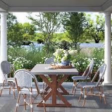 Outdoor wood dining tables provide a warm and classic touch, while glass or metal outdoor dining tables are sleek and modern. Nautica Outdoor Dining Table Set Birch Lane