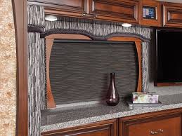 If your shades came with a separate valance, mount the cassette valance by sliding it over the shade assembly and pushing in the tabs. Automotion Rv Roller Shades