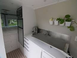 Using Ikea Cabinets In A Sprinter Promaster Transit Camper Van Conversion Van Conversion Interior Camper Van Conversion Diy Camper Van