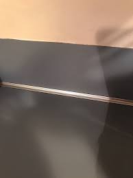 The jig should lie on the portion of the backsplash that this is why it is primarily used in bathrooms, or in display areas like a mantel over a fireplace. How Do I Remove The Metal Strip Between My Countertop And Backsplash Hometalk