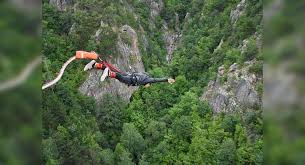 Bungee jumping (/ˈbʌndʒi/), also spelt bungy jumping, is an activity that involves a person jumping from a great height while connected to a large elastic cord. 5 Best Bungee Jumping Spots In India Times Of India Travel