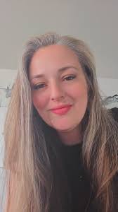 Should I get dark black hair with a loose spiral perm?