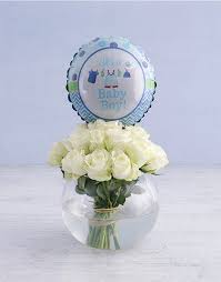 Celebrate the new arrival with fresh cut flowers, balloon bouquet or with one of our special baby baskets chocked full of handy products with both new baby and mommy in mind. Flowers For A Baby Boy With A Balloon Durban Florist