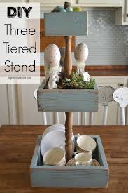 It's fun to find little items to decorate each shelf. Diy Three Tiered Stand Cool Wood Projects Scrap Wood Projects Diy Wood Projects