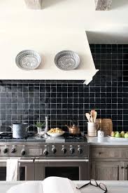 11 Black Kitchens Black Cabinet And Backsplash Ideas