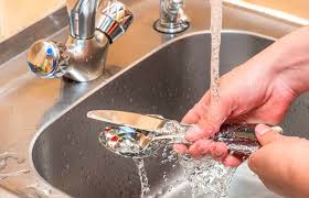sanitizing utensils by hand