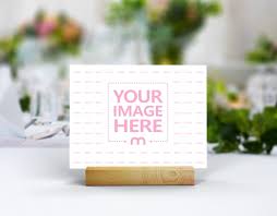 Download Landscape Wedding Card Table Number On Wooden Holder Mockup Mediamodifier