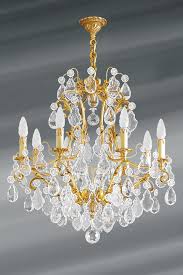 All manufacturing processes are 100% hand made. Louis Xv Bronze Old Gold And Bohemian Crystal Chandelier Eight Lights Lucien Gau Massive Bronze Lightings Made In France Lustre En Bronze Massif Patine Vieil Or Et Pampilles En