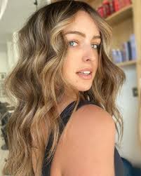 Long round layered haircut in Malvern