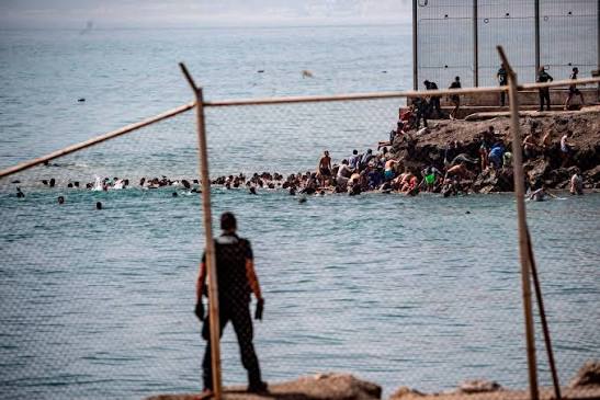 Absolute chaos' as thousands of people breach Morocco's border with Spain's Ceuta