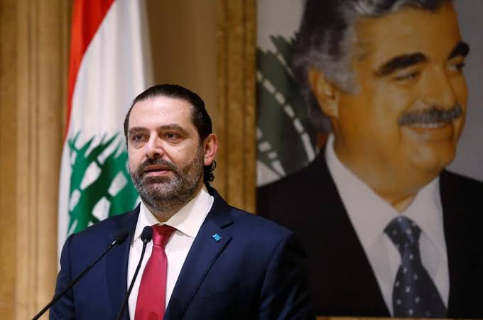 Image result for PM Hariri resigns as  Lebanon crisis turns violent"