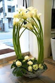 Pin By Ane Castro On Calla Lily Large Floral Arrangements White Flower Arrangements Flower Arrangements