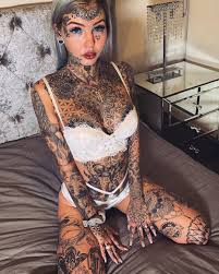 Great news!!!you're in the right place for crazy tattoo. Dragon Girl Who Has Over 20 000 Worth Of Piercings And Tattoos Has Revealed Her Latest Modification Tattooing Her Eyeballs Blue