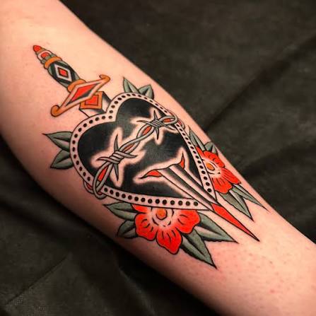 Traditional dagger through a heart. Made in Nashville at @duelinthesun not long ago. I'm booking appointments into April/May at the moment! Use the contact link on my page to text me about