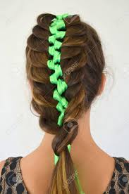 Half up hairstyle, arrowhead braid tutorial. Hairstyle With Long Hair Braided Ribbon In Her Hair Stock Photo Picture And Royalty Free Image Image 64632262