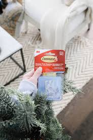 See more ideas about fireplace garland, flower arrangements, mantel decorations. How To Hang A Holiday Garland Without Damaging Your Walls Or Mantle A Blissful Nest