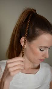 Holding the hair in one hand, tuck it under, then insert a large bobby pin horizontally to secure the bun. A Wraparound Braided Bun Tutorial M Loves M