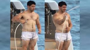 Nick jonas and priyanka chopra celebrated the holiday while covered in colorful powders, which nick jonas drops spaceman album and music video (featuring wife priyanka chopra!) for song of. Nick Jonas Shirtless Photos Go Viral Netizens Want To Play With His Love Handles