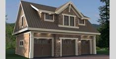 Sloping metal roof, concrete siding and glass door. 100 Garage Plans And Detached Garage Plans With Loft Or Apartment