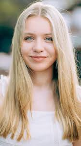 I bumped into Greta weeks ago and was instantly struck by her cool outfit  and accessories. I just had to walk up and ask her for a portrait, and  luckily, she was