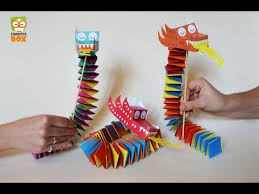 Check spelling or type a new query. Diy Flash How To Make A Paper Dragon Youtube Paper Dragon Craft Paper Doll Chain Dragon Crafts