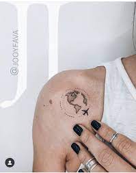 Perfect travel tattoo of the globe parachute. Travel Tattoo Tiny Tattoos Globe Tattoos Mini Tattoos