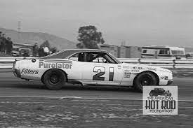 David Pearson In The Famous Number 21 Woods Brothers Car Is Captured At Riverside International Raceway During The Nascar Win Racing Vintage Racing Drag Racing