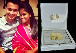 Cut a large x in the fabric covering the opening on the bottom lid and also tuck the fabric inside. A Look At Arpita Khan S Royal Wedding Invitation View Pics Bollywood News India Tv