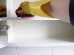 A bleach solution also works to kill mold. How To Clean Mold From Bathroom Cabinets Howcast