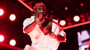 The rapper has come under sharp criticism for comments he made at a music festival and on instagram. 3ej494 Lkjkarm