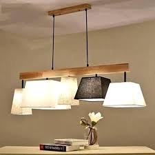 Wohnzimmer Lampe Ideen Tipps Beispiele Und Fotos Zur Auswahl Der Korrekten Mobel Fur Ihren Wohnbereich Das Wohnzimme Wohnzimmerlampe Lampe Holzbalken Lampe